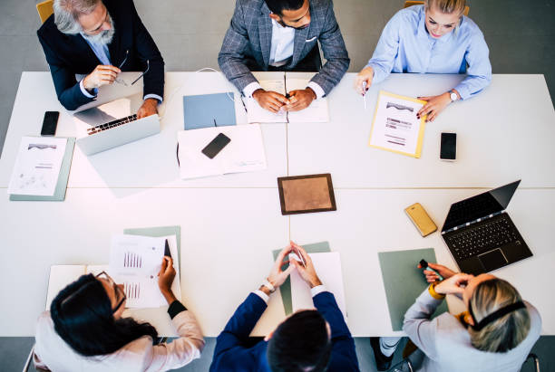 istock Business People Having a Meeting 1190135831