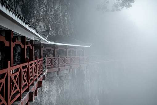 Misty Walkway balconies on the cliff of a Zhangjiajie (Zhangjiajie) Tianmen mountain (Tianmen Mountain) side, in Hunan Province, China.