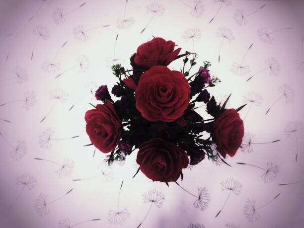 Beautiful bright red roses on a vintage background