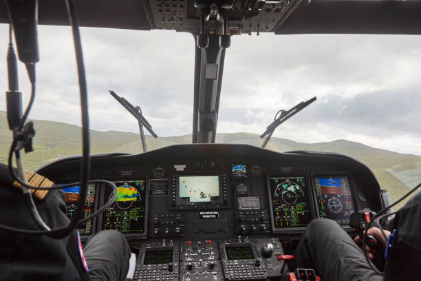 istock Helicopter cabin flying over Faroe Islands mountains. Denmark 1190137155