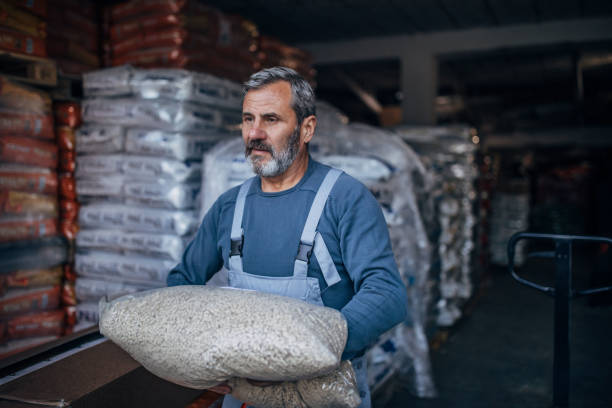 istock The warehouse worker carries the goods 1190137219