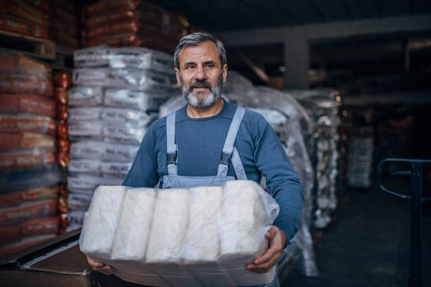istock The warehouse worker carries the goods 1190137220