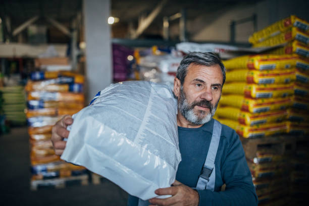 istock The warehouse worker carries the goods 1190137239