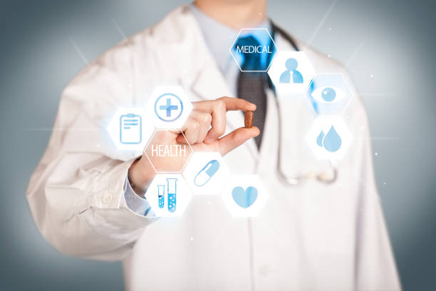 istock A doctor in white holding a pill 1190137345