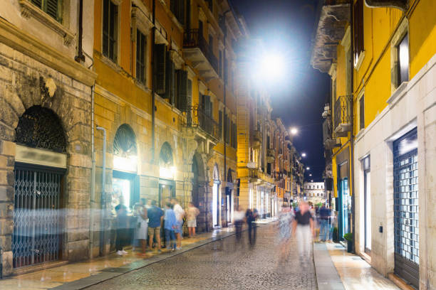 istock Illuminated Verona streets in night 1190138612