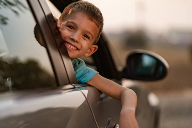 istock Beautiful boy having fun on a roadtrip 1190140058