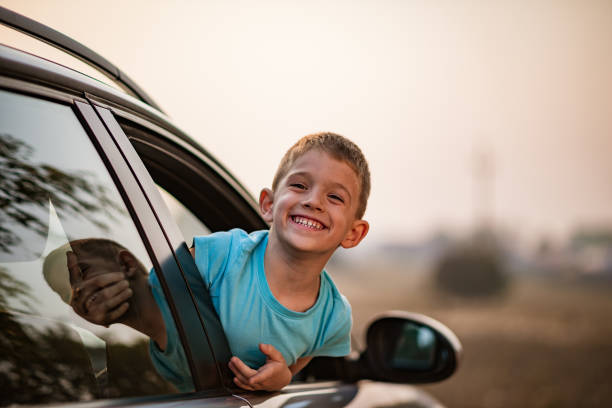 istock Beautiful boy having fun on a roadtrip 1190140096
