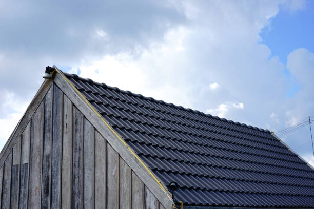 istock Grey roof shingle with blue sky background 1190140951