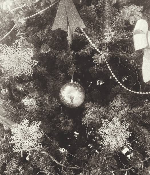 istock Christmas decorations and decorations on a green tree 1190141065