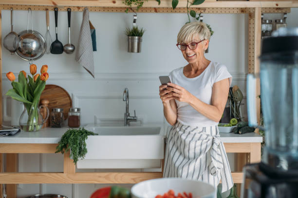 istock Senior Woman Using Smart Phone 1190142740