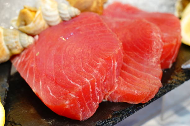 istock Slices of raw tuna fish meat 1190146371