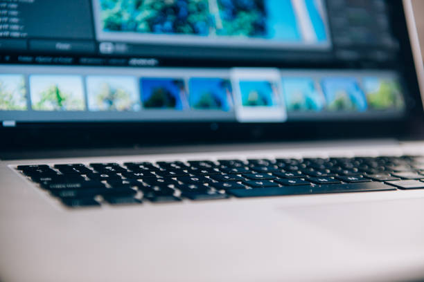 istock Man working with laptop in office interior 1190148492