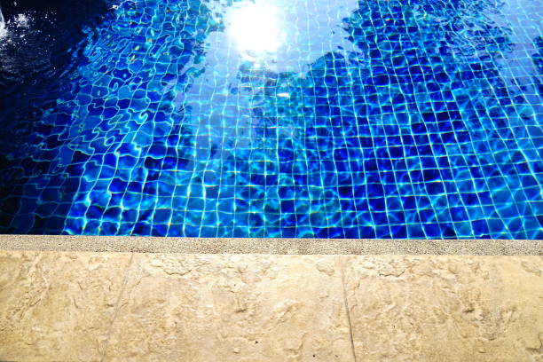 Sunlight and surface of a swimming pool