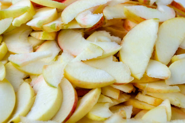 istock Wet apple slices. Food background 1190149005