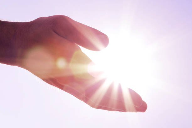 istock Sun in my hand 1190150058