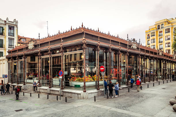 Madrid, Spain - October 19, 2019: Local people and tourists in front of San Miguel Market (Mercado de San Miguel) in Madrid, Spain.