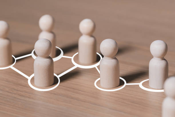 istock Social connections by white lines with people figurines , Call for cooperation creating a new team and action contacts communication  in society 1190150845
