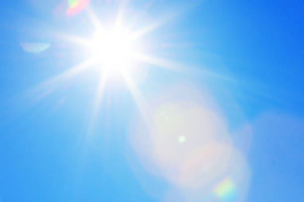 istock Bright sun with beautiful beams in the sky 1190150851