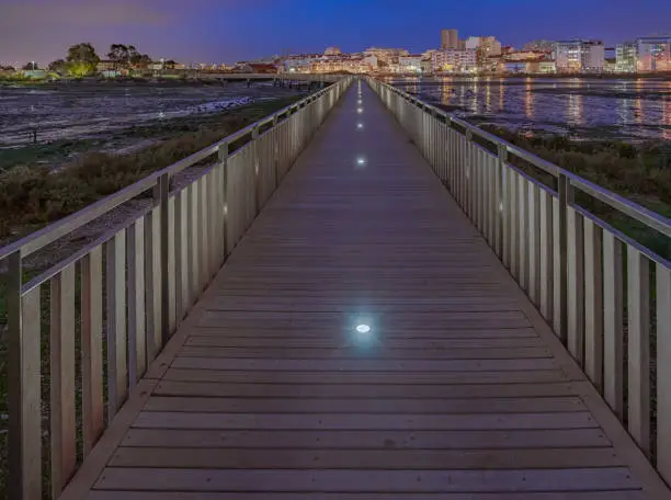 Gangway of Barreiro town in Charco night image with an empty tide.