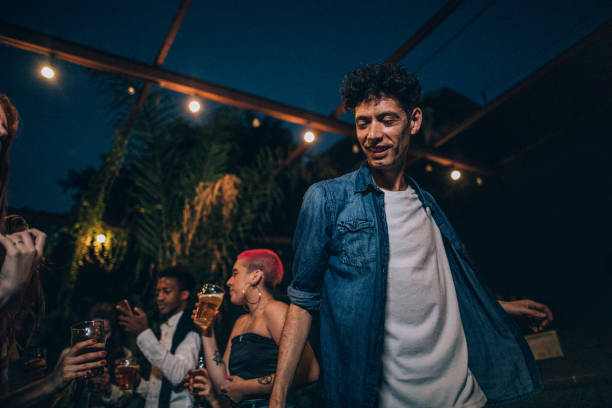 istock People dancing at the party 1190152999