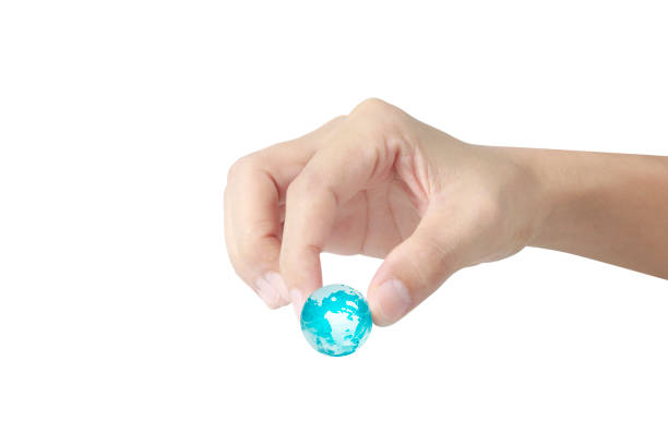 istock Globe ,earth in hand, holding our planet glowing. Earth image provided by Nasa 1190154358