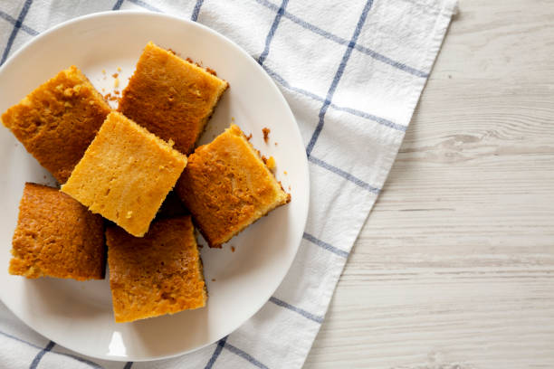 istock Homemade Sliced Cornbread Ready to Eat on a white plate, top view. Flat lay, overhead, from above. Copy space. 1190154971