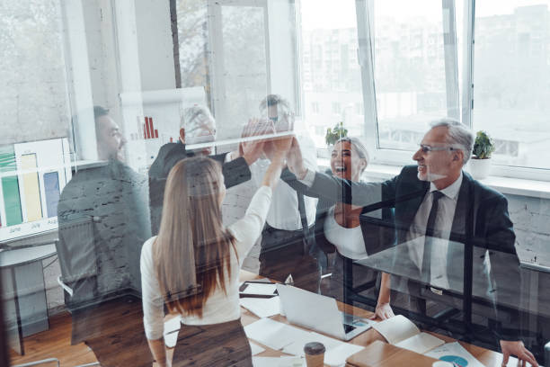 istock Cheerful business team 1190157557
