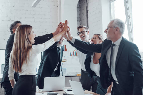 istock Cheerful business team 1190157887