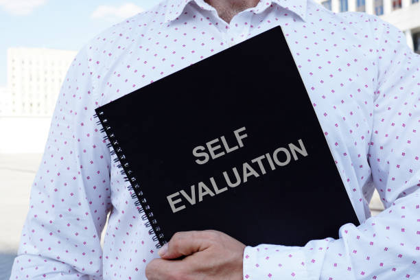 istock Text sign showing hand written words self evaluation 1190159418