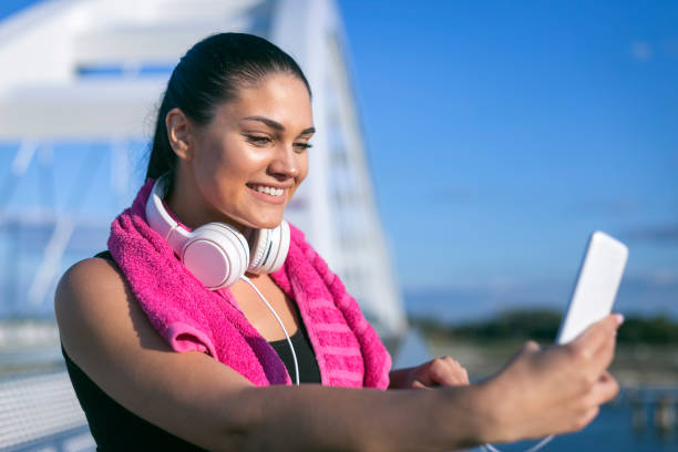 istock Happy woman taking selfie 1190161753
