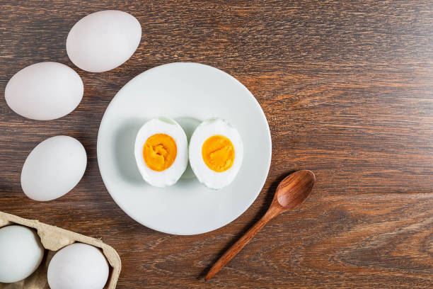 istock White duck eggs and salted egg food on a wooden table 1190162032