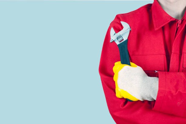 worker man with smoking pipes - heating engineer imagens e fotografias de stock