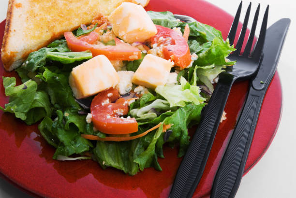 Side Salad with Toasted Bread A delicious healthy eating side salad with toasted bread and topped with cubes of Colby cheddar cheese. colby cheddar stock pictures, royalty-free photos & images