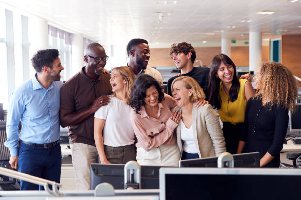 istock Happy Business Team Working In Modern Office Laughing Together 1190167126