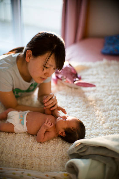 istock mother and new born baby 1190167290