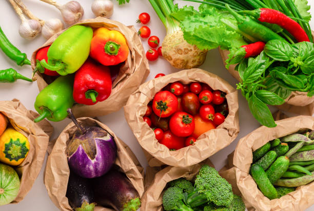 istock Assorted raw organic vegetables from garden in zero waste packages 1190167338