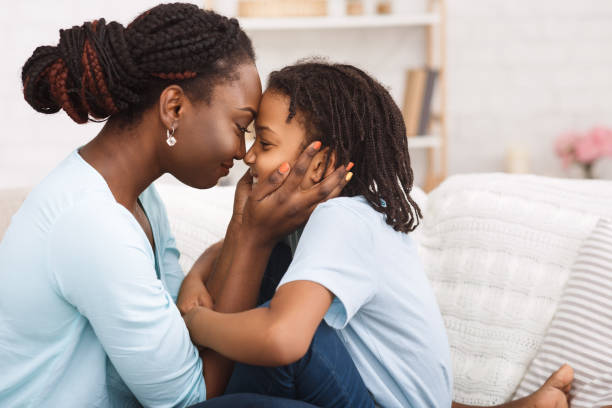 istock Loving african mom spending time with child 1190167623