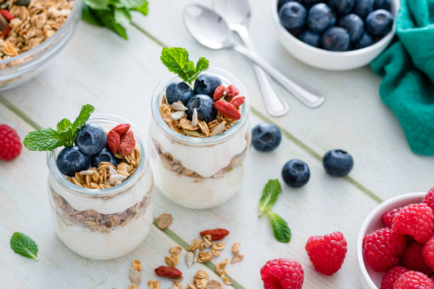 istock Healthy food: homemade yogurt with granola on breakfast table. 1190168773