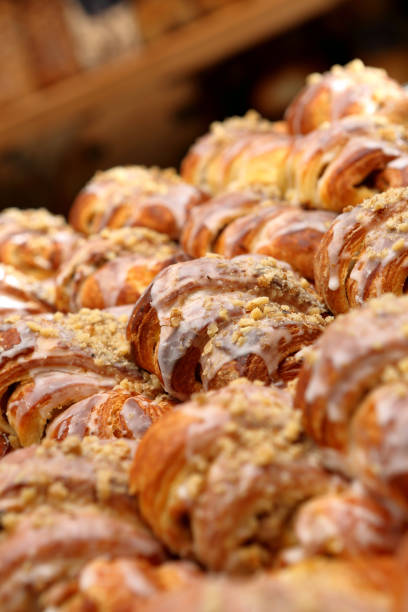 istock Fresh croissant  with nuts and icing in the cake shop 1190171536