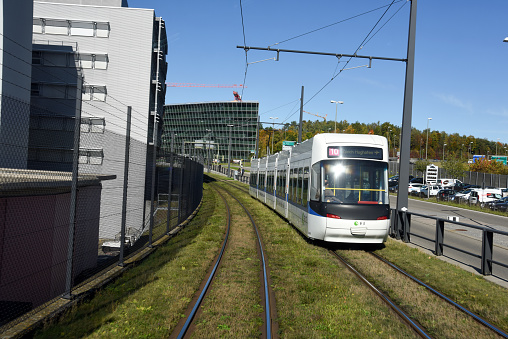 The Glattabahn is one of the newest public tranport lines of Zurich City. The Line 10 offers its Service between Zurich City to Airport Zurich. The image shows a tram composition next to the Airport Zurich ZRH.