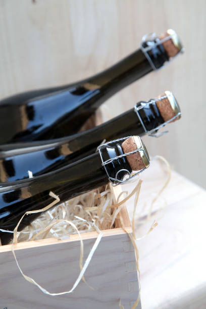 istock sparkling wine bottles in a wooden box 1190178485