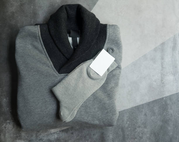 istock Turtleneck warm gray sweater on gray background. Warm sweater 1190178502