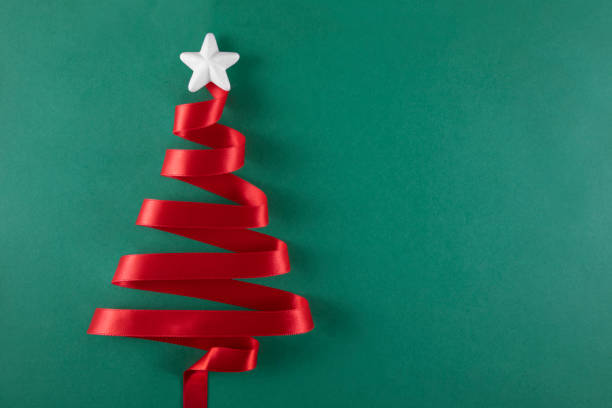 istock Red Christmas Tree with Ribbon 1190179753