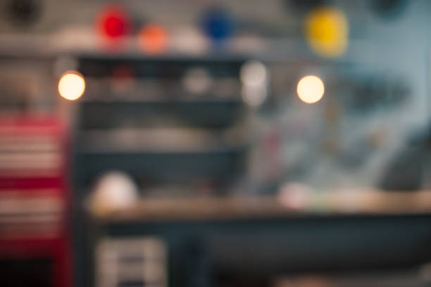 istock Blurred out of focus de-focused image of retro / vintage workshop with misc. tools. 1190179860