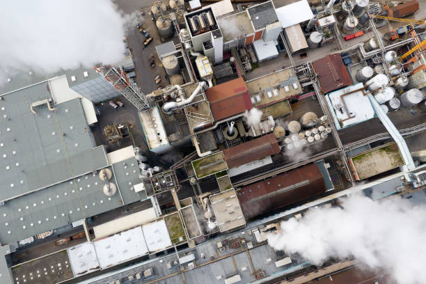 istock Smoke over paper mill, aerial view 1190189814