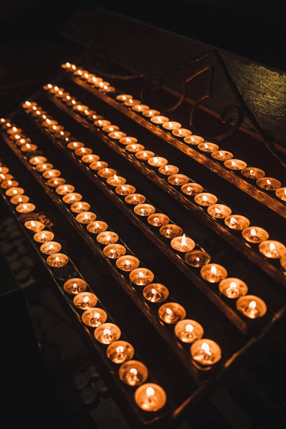 istock candles in the Church 1190190113