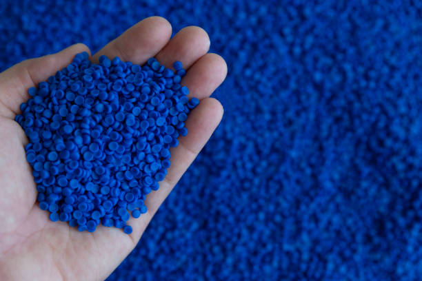 istock Close-up of plastic polymer granules. hand hold Polymer pellets. polymer plastic. compound polymer. 1190190220