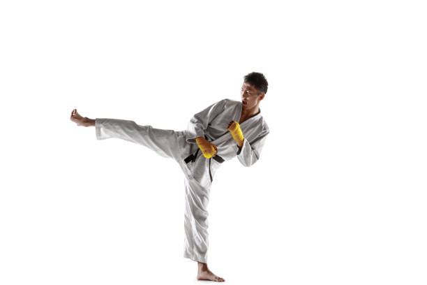istock Confident korean man in kimono practicing hand-to-hand combat, martial arts 1190191841