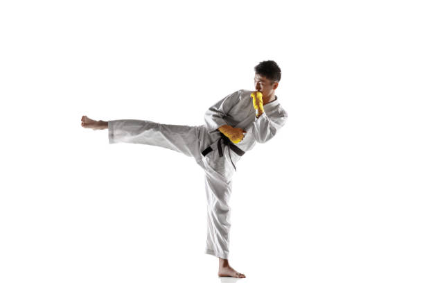 istock Confident korean man in kimono practicing hand-to-hand combat, martial arts 1190191868