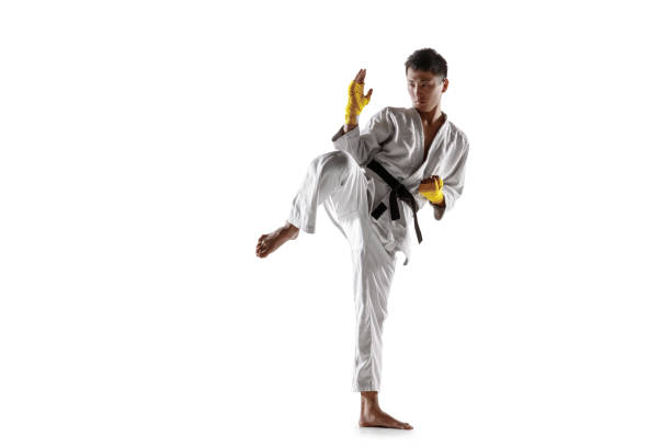 istock Confident korean man in kimono practicing hand-to-hand combat, martial arts 1190191874